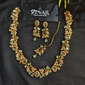 Sleek Leaf Pattern Party Wear Jewellery Set with Earrings & Maang Tikka | Zevar