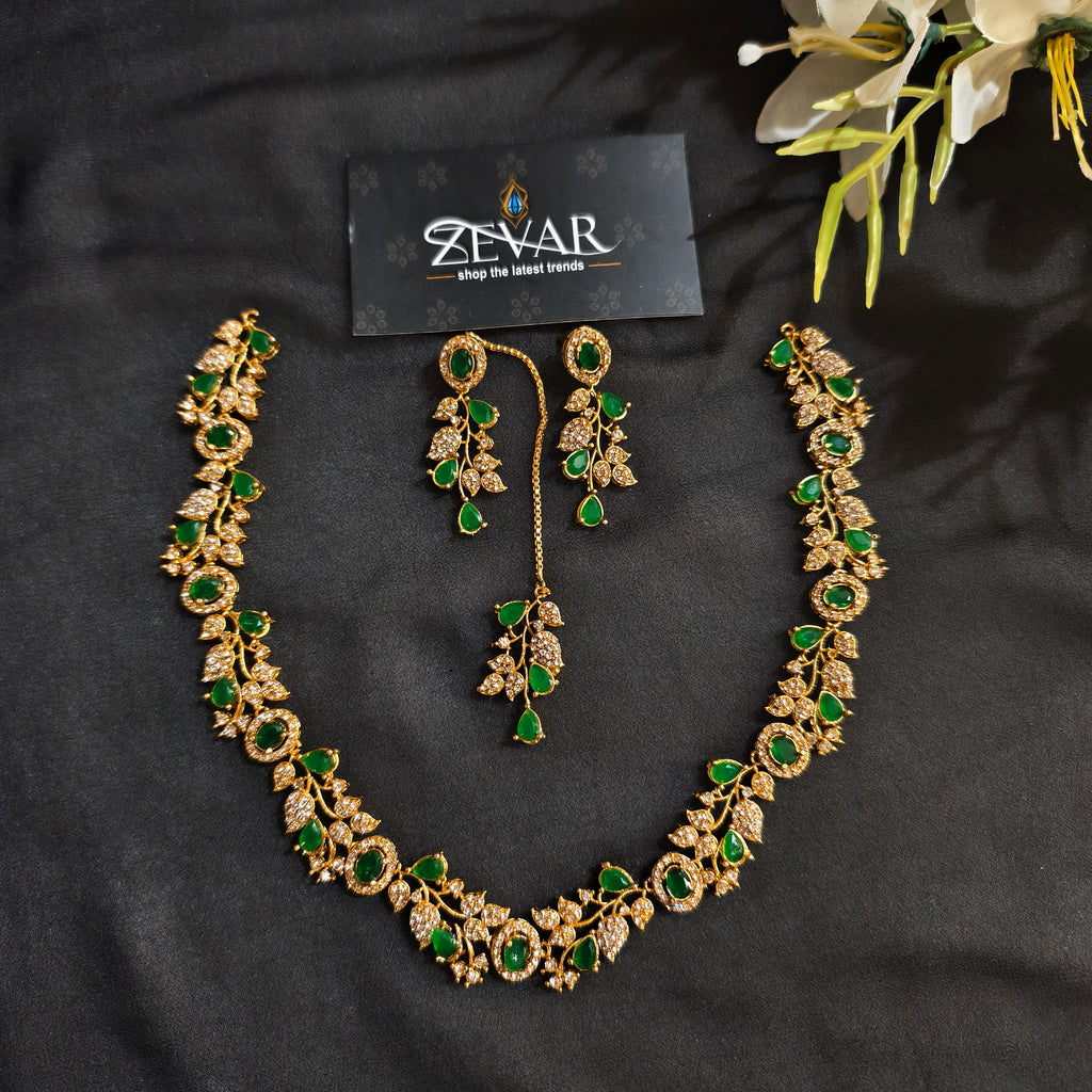 Sleek Leaf Pattern Party Wear Jewellery Set with Earrings & Maang Tikka | Zevar