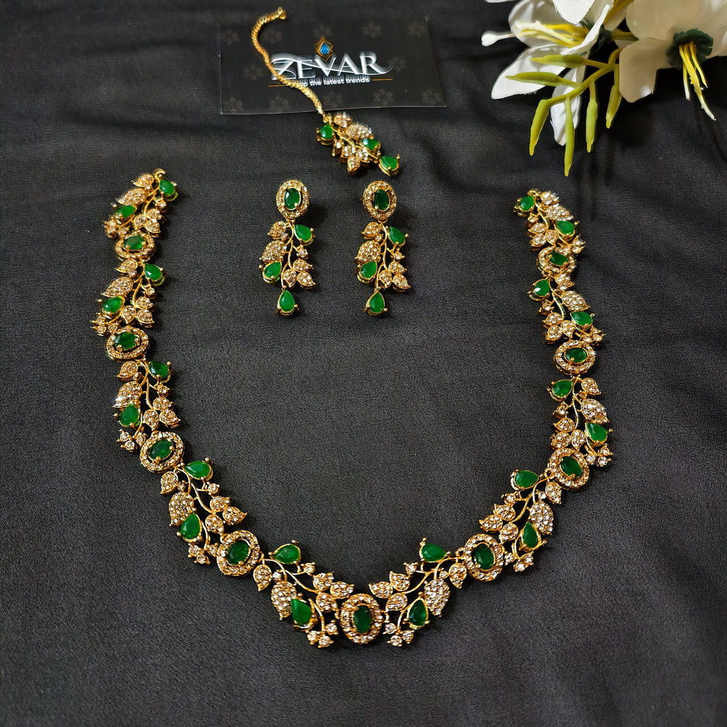 Sleek Leaf Pattern Party Wear Jewellery Set with Earrings & Maang Tikka | Zevar